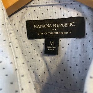 Banana Republic dress shirt, one of my favorites. He's always been dry cleaned.